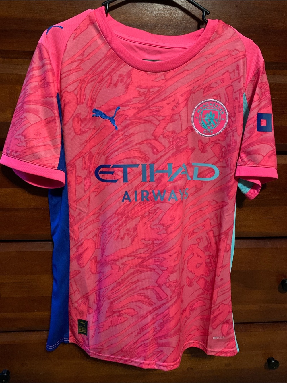 Puma Mens Pink Manchester City Training Jersey with Blue Accents